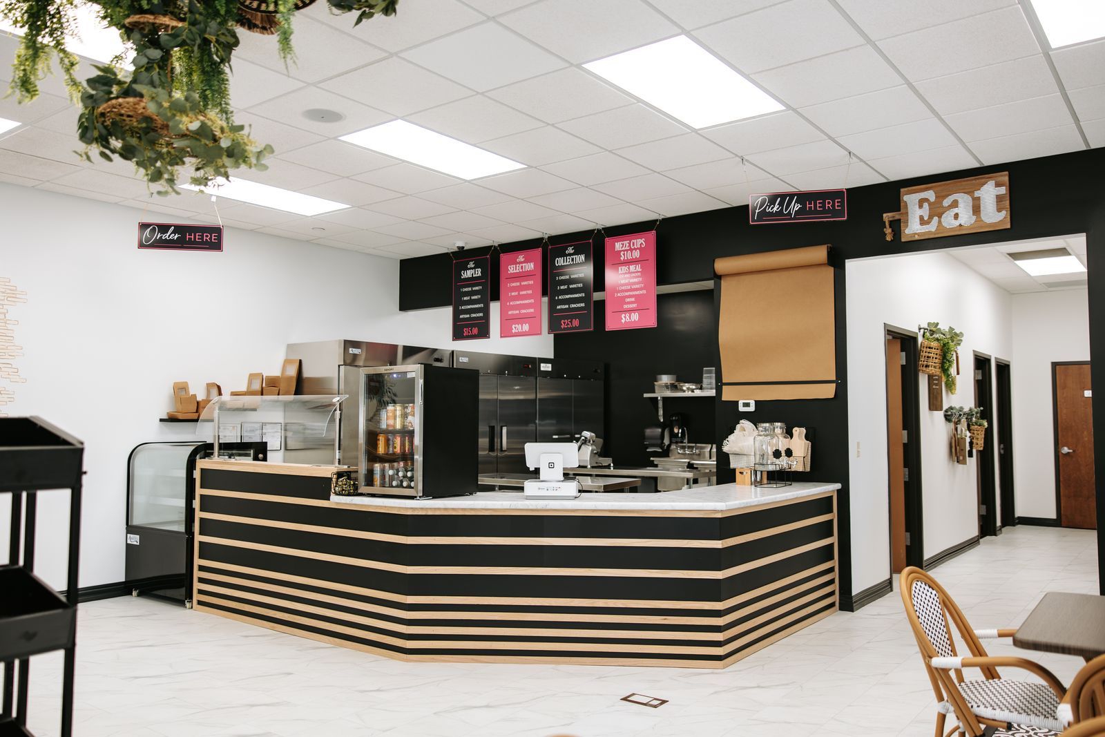 The full Modern Meze venue: order counter, menu boards, and dining room